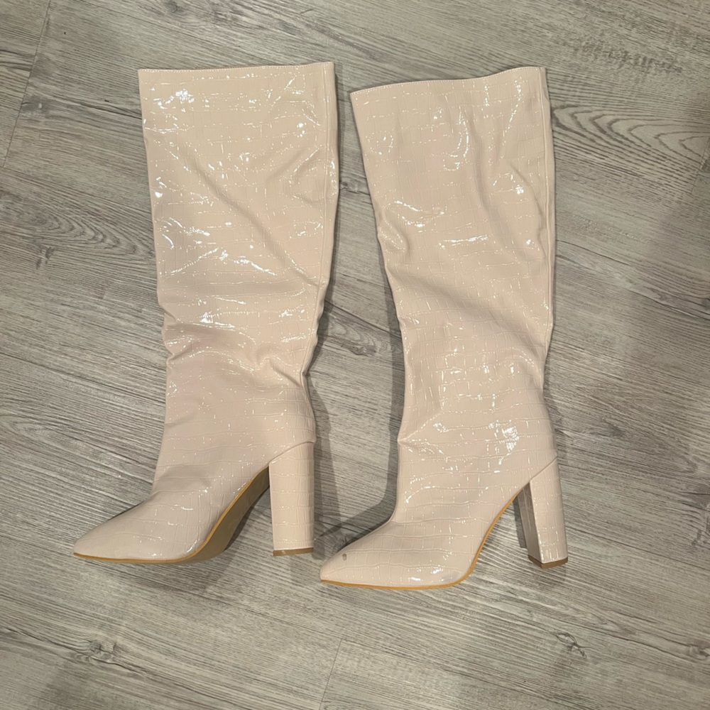 Knee High Heeled Boots.